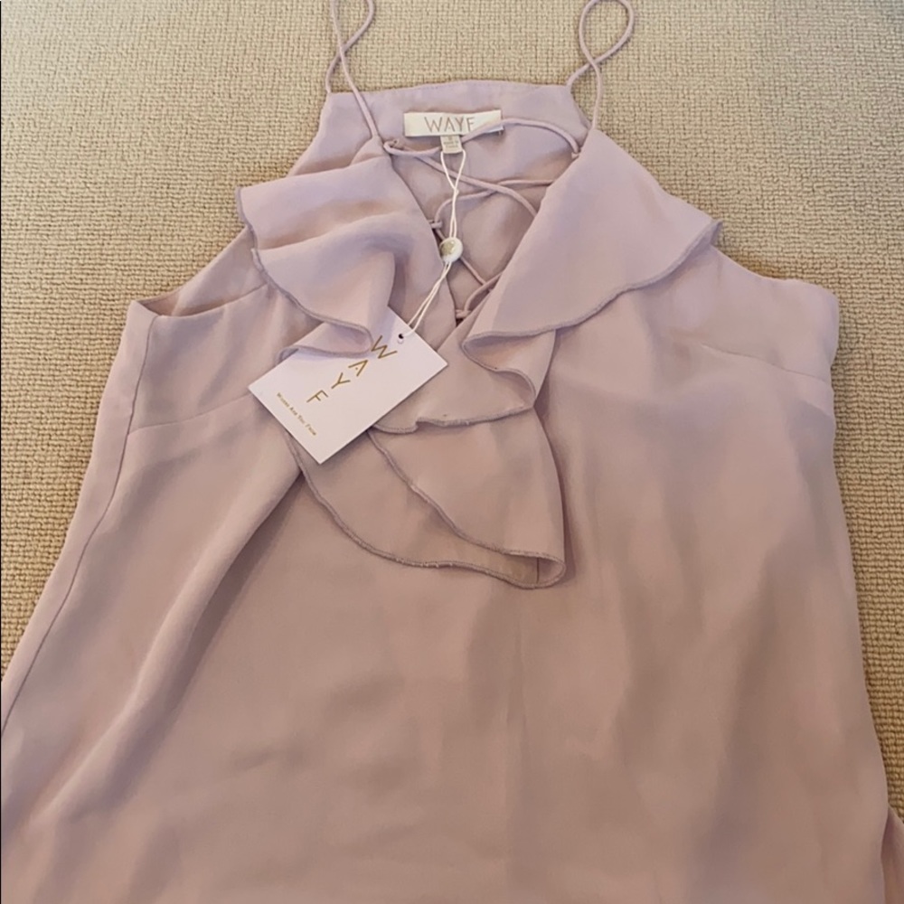 sleeveless light purple top